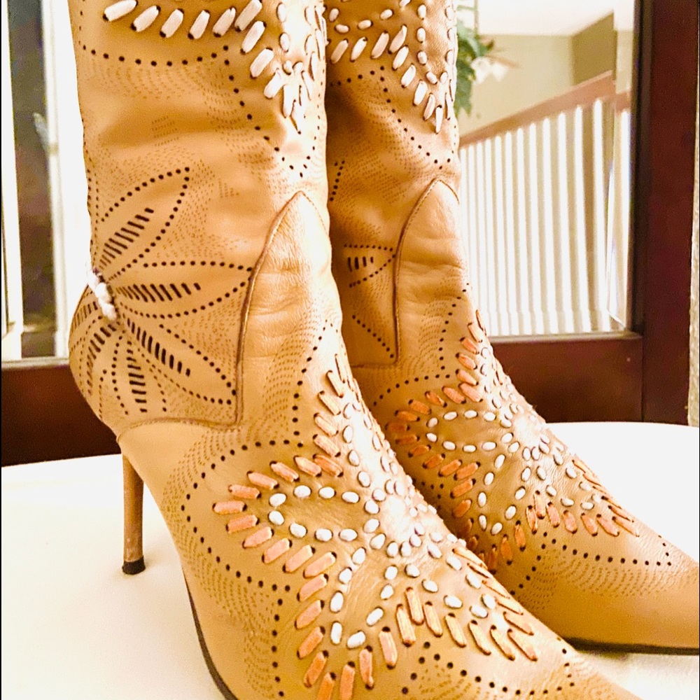 Beautiful detail on these leather boots. All leather